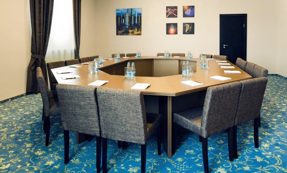 Luxurious armchairs and table in Alfavito Hotel conference hall - yavorina.com.ua