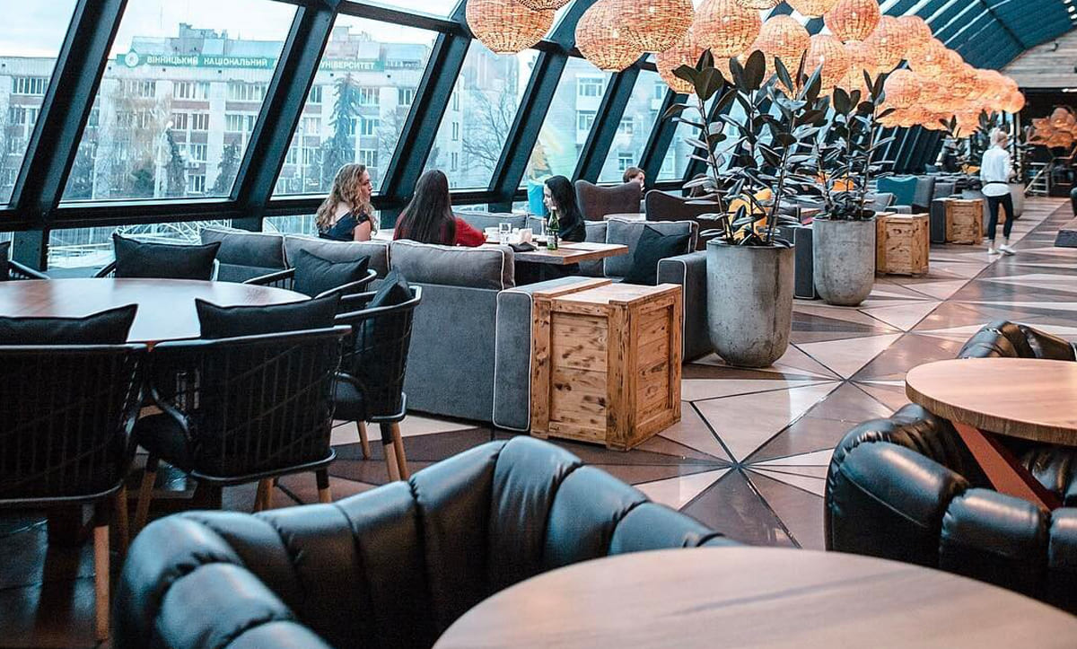 Custom armchairs enhancing the interior of Aura Restaurant, Vinnytsia