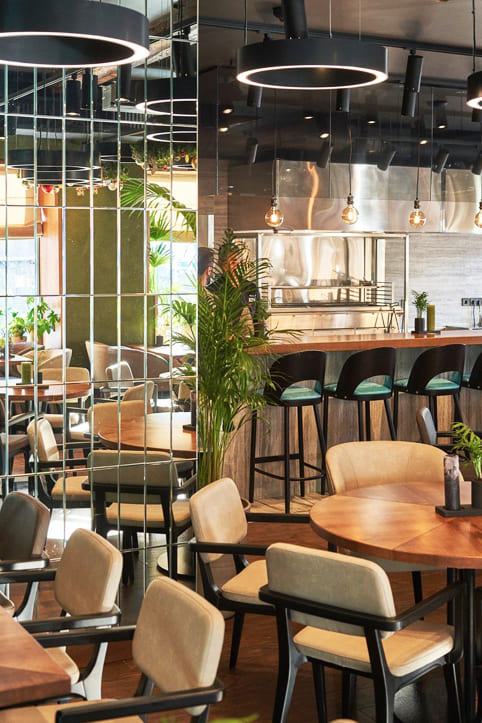 Tailored bar chairs and tables by Yavorina in Green Bar, Kyiv