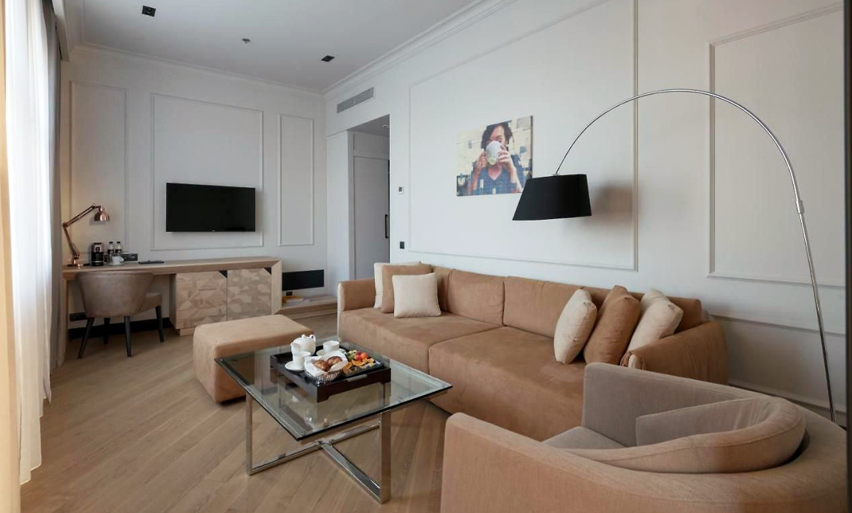 Chic sofa in Riviera House Hotel guest room - yavorina.com.ua