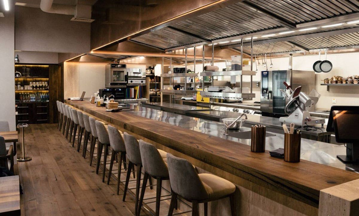 Stylish armchairs complementing the modern interior at CHEF’s TABLE - yavorina.com.ua