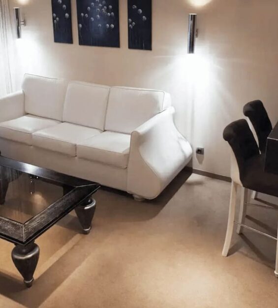 Luxurious wooden bed with upholstered headboard in Orly Park Hotel room - yavorina.com.ua