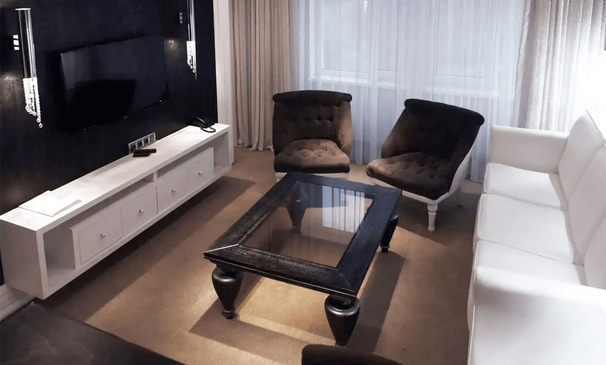 Elegant wooden coffee table in the Orly Park Hotel lobby area - yavorina.com.ua