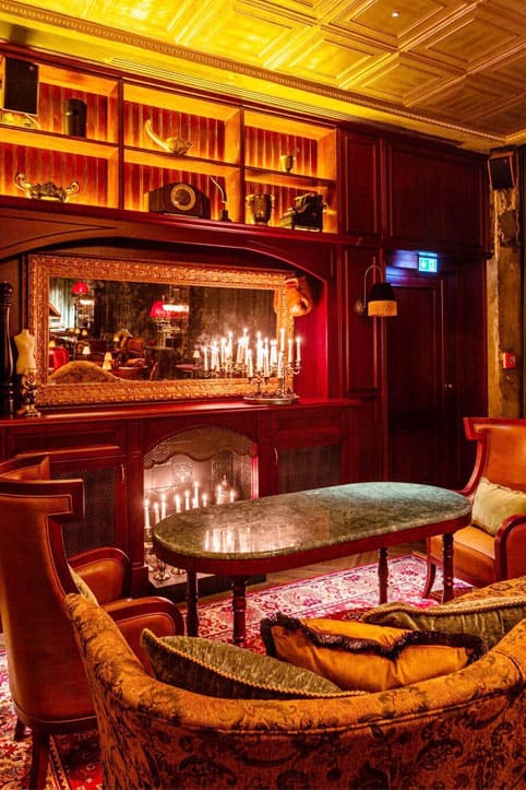 Bespoke leather armchairs in the private dining area of Bellboy - yavorina.com.ua